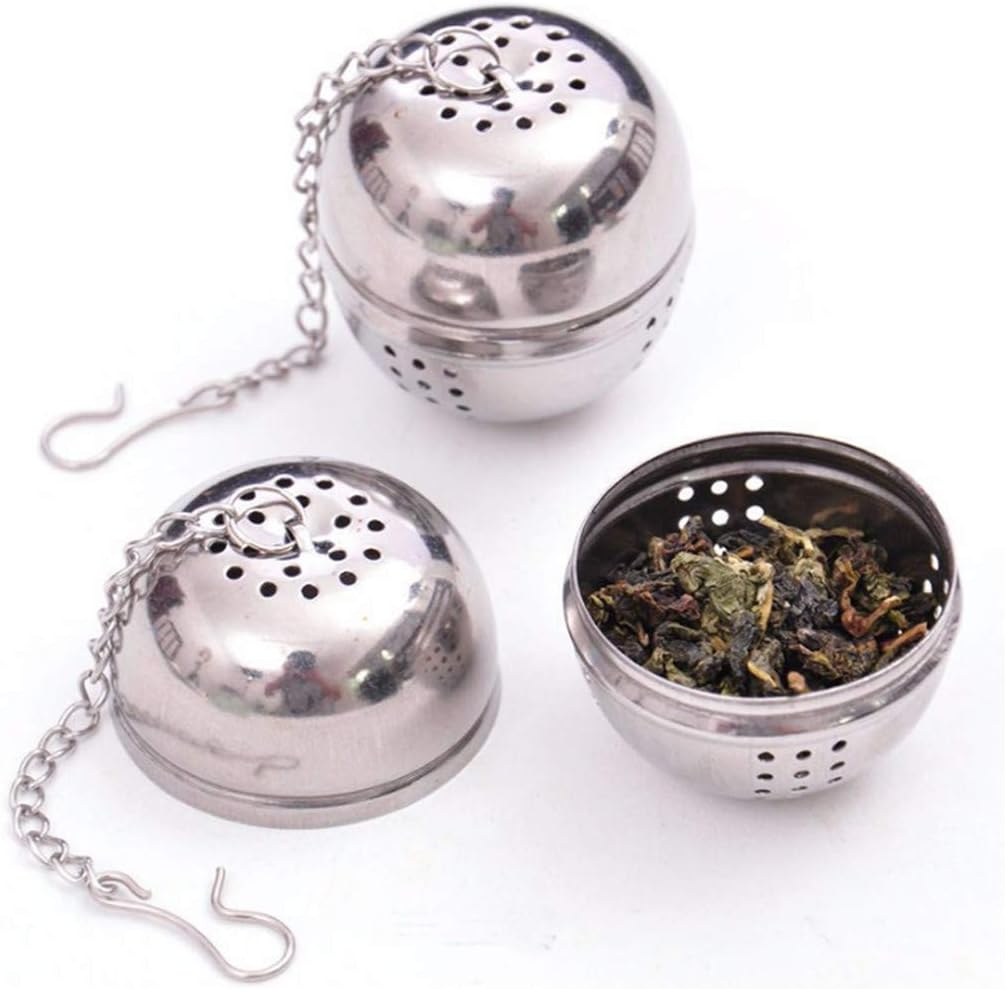 Picture of Round infuser ball that screws on together one closed and one open showing Tea